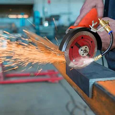 Dust Busting Water Spray Attachment For Angle Grinder 7 Inch Wet Spray Tool with sparks on metal cutting, in use with flexible tube