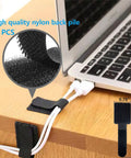 Boss Level Cable Management Kit For TV And Office with nylon straps securing laptop cables on desk