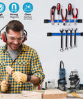 Man woodworking with tools on Six Piece 12 Inch Magnetic Tool Holder Strips With Mounting Brackets For Garage Organization Blue Metal Tool Organizer Rack Easy To Install With Screws Included