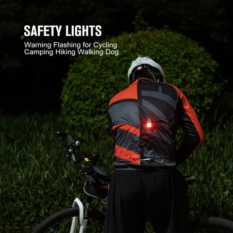 Cyclist at night with safety light, wearing a helmet and jacket, showcasing Oclip Mini Rechargeable EDC Clip Flashlight With Dual Light Sources White Daylight And Red Night Vision, Ultra Lightweight 1.05 Oz Pocket Keychain Clip Light For Everyday Carry And Outdoor Adventures.