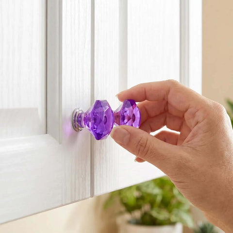 Installing purple from Colorful Crystal Cabinet Knobs Set 10 Pack 26mm Drawer Pulls in Five Dope Colors on cabinet