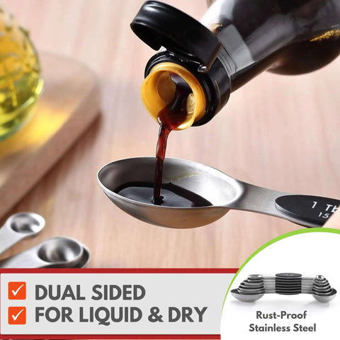 Close-up of Magnetic Stainless Steel Measuring Spoons Set 8 Pieces With Leveler, measuring liquid, dual-sided, rust-proof steel.