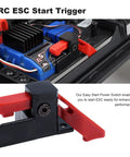 Close-up of Easy Start ESC Trigger Power Switch for Traxxas TRX-4 1/10 RC Trail Crawler, shown with quick start button in plastic.