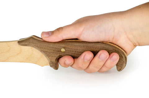 DIY Wooden Knife Making Kit For Kids Teens And Adults - Real Wood Craft Gift with hand holding walnut handle and beech blade.
