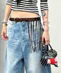 Vintage Industrial Waist Belt Featuring Heavy Copper Hardware And Flowing Tassels With Easy Adjustable Strap In Warm Coffee Brown For Daily Wear That Gives Serious Drip styled with high-waisted jeans.