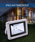 RGB Color Changing LED Flood Lights With Remote Dimmable IP65 Waterproof Stage Lighting For Indoor Outdoor Decor displayed outside in rain.