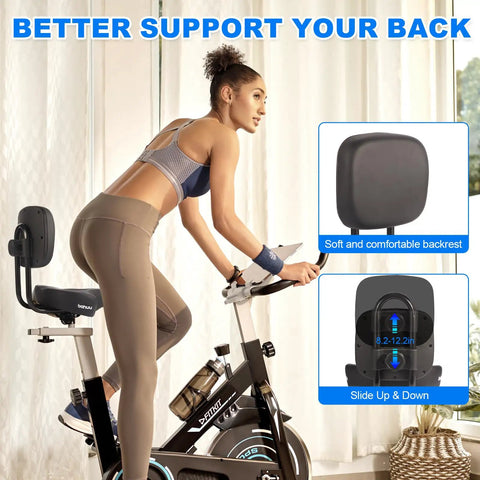 Woman using indoor exercise bike with extra wide bike seat and backrest for support. Focus on cozy cushioned saddle for comfort.