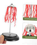 Electric Plume Physics Teaching Kit For Electrostatics Learning Two Pack Hands On Classroom Experiments showing red filaments.