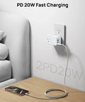 Heavy Duty Multi Plug Outlet Extender With Dual PD 20W USB C Fast Chargers And Three AC Sockets Flex Your Tech Stash charging phone on a coffee table.
