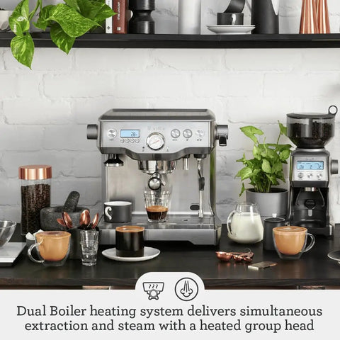 Dual Boiler Espresso Machine in Brushed Stainless Steel Featuring 58mm Commercial Portafilter and Precision Temp Control for Killer Shots and Legit Barista Quality Coffee at Home on kitchen counter.