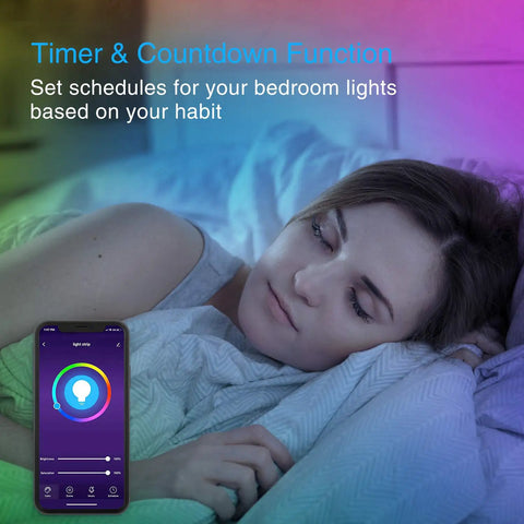 Woman in bed with 33 Feet LED Strip Lights With App Control And Voice Assistant Compatibility RGB Color Changing Lit Mood Lights For Bedroom Decor
