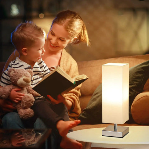 Cozy Minimalist Table Lamp For Bedroom Bedside Nightstand With Square Fabric Shade, Desk Reading Light For Kids Room Living Room Or Office, White Shade And Silver Base, UL Listed, beside a mother reading to child
