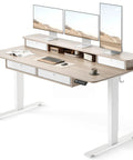 Fezibo 60 By 30 Inch Electric Standing Desk With Drawers Light Rustic Brown Finish showcasing dual monitors and storage compartments.