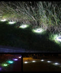 Colorized Solar Ground Lights With 20 Lumens Dope Outdoor RGB LEDs illuminating garden path, showcasing color-changing waterproof feature.