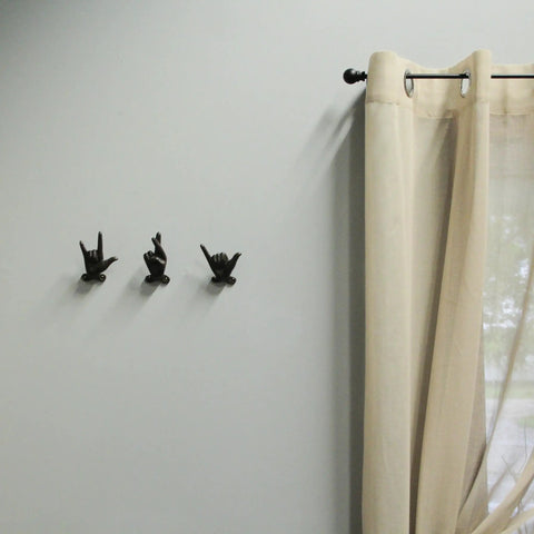 Set Of 3 Hand Gesture Wall Hooks, rustic cast iron decor with playful hand gestures on a wall, 4 inch metal coat rack.