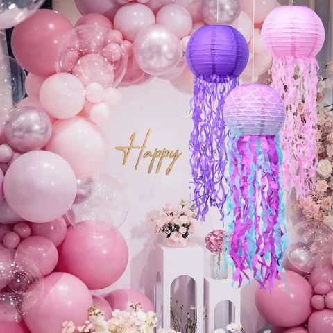 Jellyfish Paper Lanterns 6 Pack Hanging Lit Colorful Lanterns For Mermaid Unicorn Theme Classroom Decor Under The Sea Ocean Birthday Party Decorations For Undersea Parties Classroom Decor And Birthday Celebrations hanging with pink balloons.