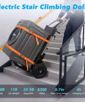 Sturdy Electric Stair Climbing Dolly With A Beefy 1500 Watt Motor Making No Sweat Moves On Steps For Quick Transport Of Appliances And Heavy Couches In Black carrying a washer on stairs.