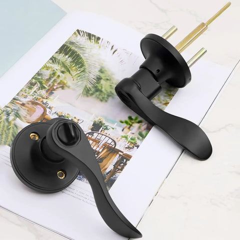 4 Pack Black Wave Style Privacy Door Handles With Lock for bedroom and bathroom interior doors on open decorative book