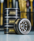 Beadlock Wheel Rims For 1/24 And 1/18 RC Crawlers, Brass Weight, Black Coated, stacks and one rim angled for view.