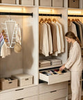 Game Changing Dual Side Closet Hanger With Twelve Rotating Hooks For Organizing Belts Scarves Ties And Gear in a modern closet.