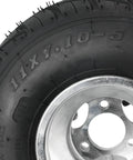 Close-up of 11x7.10-5 racer tire with 5 inch wheel for Heavy Duty 32 Inch Go Kart Rear Live Axle Kit, showing tire details