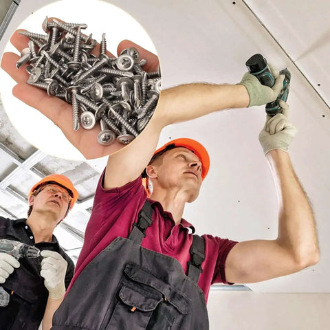 Heavy-Duty 410 Stainless Self-Tapping Screws Set With Flat Head Phillips Self-Drilling workers installing screws into ceiling