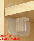 Stick On Shelf Clips No Drill Punch Free Self Adhesive Pegs supporting a shelf on a wooden cabinet, clear ABS material, size 6x6 cm.