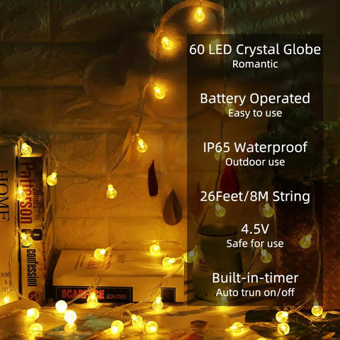 Globe String Lights 60 LED Battery Operated With Remote 26ft Waterproof Indoor Outdoor Fairy Lights on bookshelf