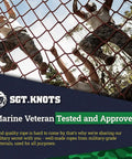Men climbing a rope net with trees in background and "Marine Veteran Tested and Approved" text overlay.