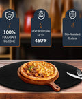 18.9 Inch Silicone Pizza Mat For Pi Prime Outdoor Oven with pizza, non-slip, heat resistant up to 450K, black color on table