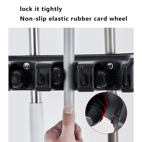 Close-up of non-slip elastic rubber card wheel on Stainless Steel Heavy Duty Floor Standing Mop Hanger And Broom Rack Organizer For Cleaning Tools Garden Gear Garage Storage Stand Movable Closet Cabinet Easy Install No Fuss.