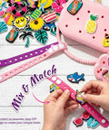 Fifty Plus Piece DIY Wristbands And Purse Kit For Girls with silicone purses, charm wristbands, and mix of colorful accessories.