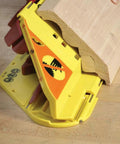 Crown Molding Cuts Made Super Easy With This Solid Miter Saw Jig positioned with trim for 38 degree angle cuts.