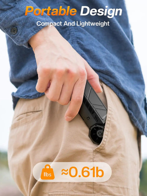 Person placing 130,000 RPM Powerhouse Electric Blower With Four Speed Settings into pocket highlighting portability