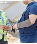 Cut Resistant Wrist Sleeves With Breathable Forearm Guards offering rock solid protection for men and women demonstrated on job site.