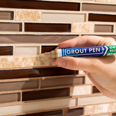Beige Tile Grout Pen For Waterproof Grout Paint And Sealer Colorant With Narrow 5mm Tip 7mL Makes Grout Look Brand New In Bathrooms And Kitchens Without Scrubbing being used on tiled surface.