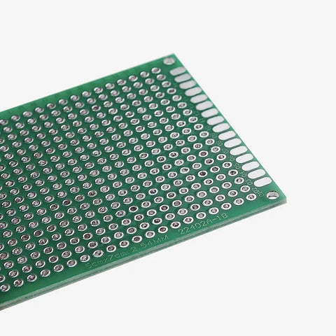Close-up of a PCB from the 32 Piece Double Sided PCB Board Prototype Kit For DIY Soldering With Five Size Options Compatible With Arduino Projects