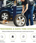 Mechanic handling tire with 4 Pack Tire Valve Stems 20008 Rubber Snap In Tubeless Airtight Fit 0.453 Inch Rim Holes Replacement