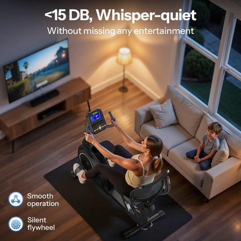 Woman using Recumbent Exercise Bike For Home Gym With Magnetic Resistance, 32 Levels, in living room beside child on sofa.