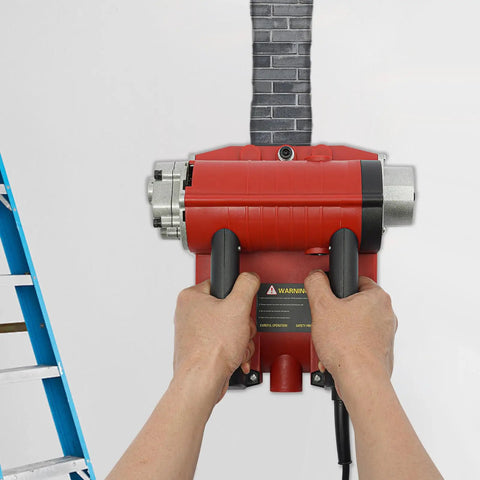 Hands holding the 4580W Electric Wall Planing Machine Pure Copper Motor preparing to strip concrete surface.
