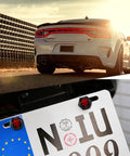 Rear view of car with Pack Of 4 Long Tooth Skull Pattern License Plate Screws Fastener Kit Aluminum Alloy Anti Theft Caps
