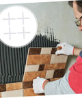 Person using 10,000 Pcs Pro Grade Tile Leveling Spacers and Positioning Cards PE Material for Quick Setup on wall installation