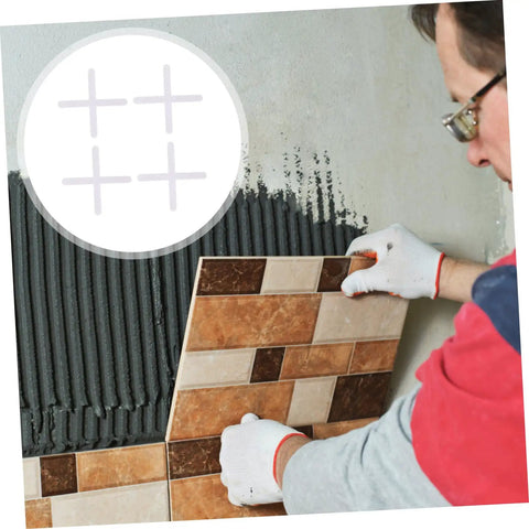 Person using 10,000 Pcs Pro Grade Tile Leveling Spacers and Positioning Cards PE Material for Quick Setup on wall installation