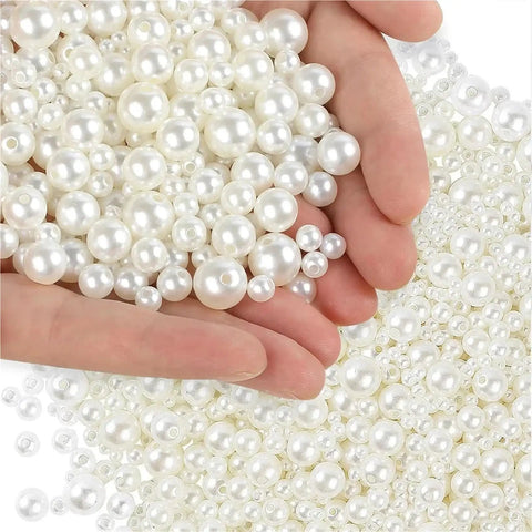 Hella Versatile Gold Imitation Pearl Spacer Beads Kit 10 Boxes 3Mm To 14Mm ABS Beads for DIY jewelry making in hand.