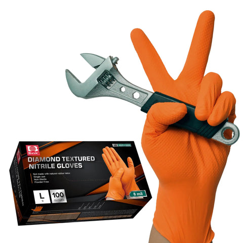 Hella Tough 8 Mil Nitrile Mechanic Gloves With Raised Diamond Texture Heavy Duty Disposable Work Gear Puncture Resistant Grease Slayer Case Of One Hundred Orange Medium displayed with wrench and box.