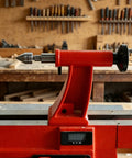 Mt2 To Mt1 Morse Taper Reducing Adapter Sleeve on a red tailstock tool for woodworking lathes, heavy duty steel construction.