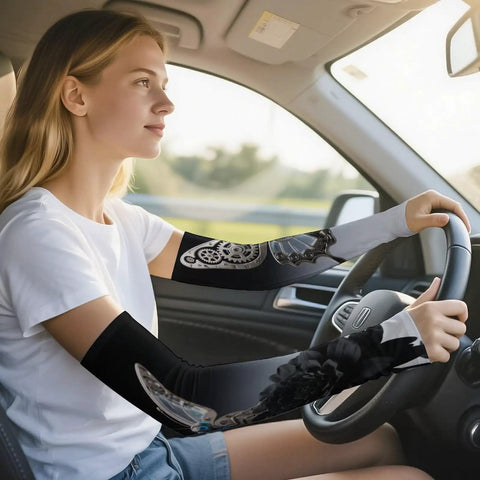Stay Cool As Ice All Summer With These Dope Butterfly Arm Sleeves Featuring Breathable Ice Silk Material and Flexible Fit for Ultimate Sun Protection Plus Top Tier Comfort On Every Outdoor Adventure, worn while driving.