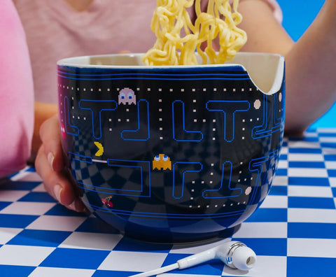 Dope Retro Maze Ramen Dinnerware Set With Ceramic Bowl And Bamboo Chopsticks, 20-Ounce Noodle Bowl For Retro Gamer Kitchens And Everyday Meals At Home, showing noodles being held with chopsticks over a maze-patterned bowl.