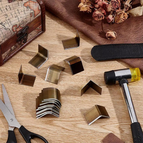 Leather Corner Punch Set With 15 Size Triangular Edge Trimmers And Circle Cutter Kit displayed with tools on a wooden table