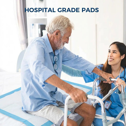 Adult using Ultra Thick, Super Absorbent Disposable Bed Pads 30x36 Inches with caregiver in hospital setting.